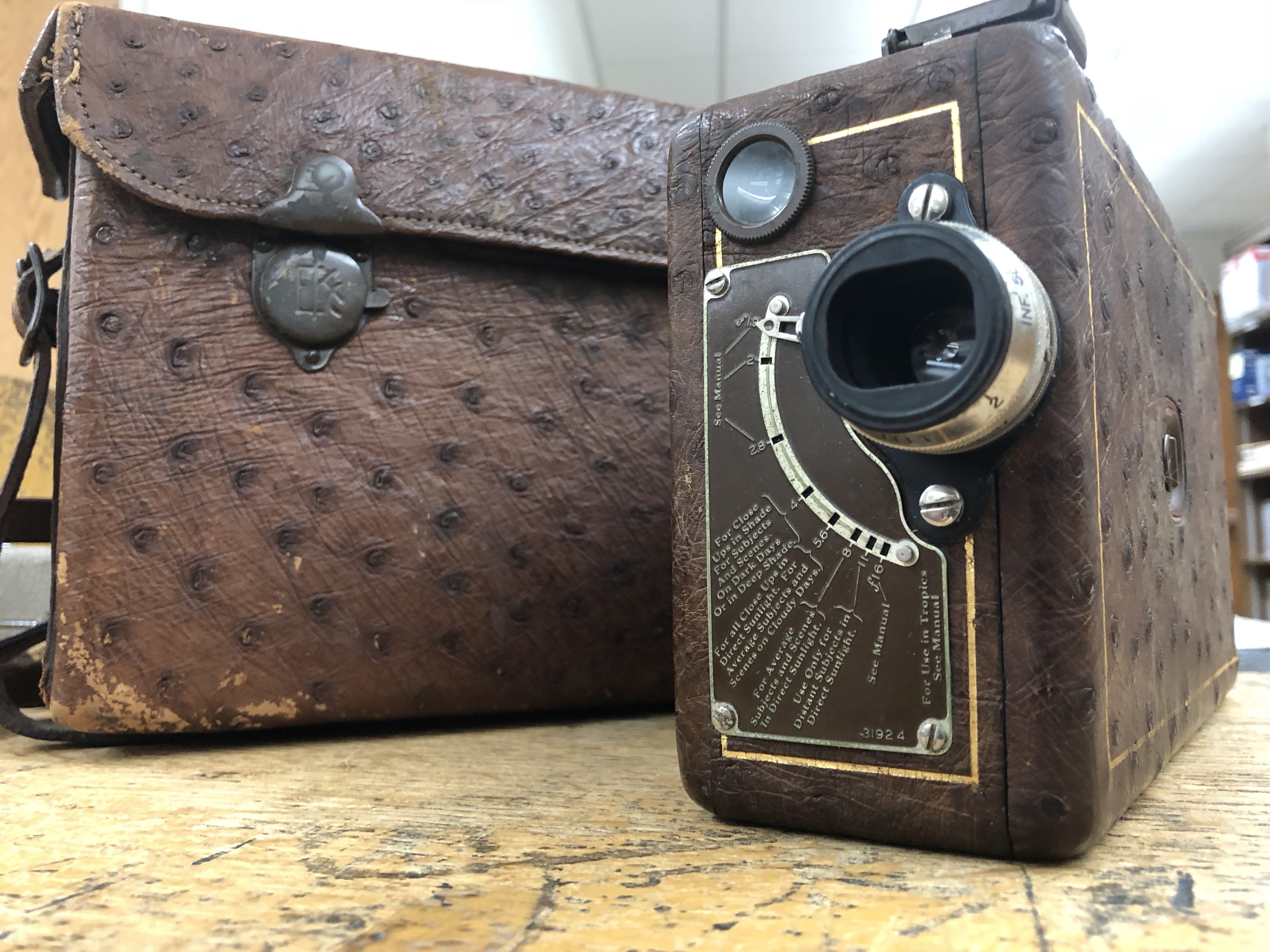 square brown antique camera and box