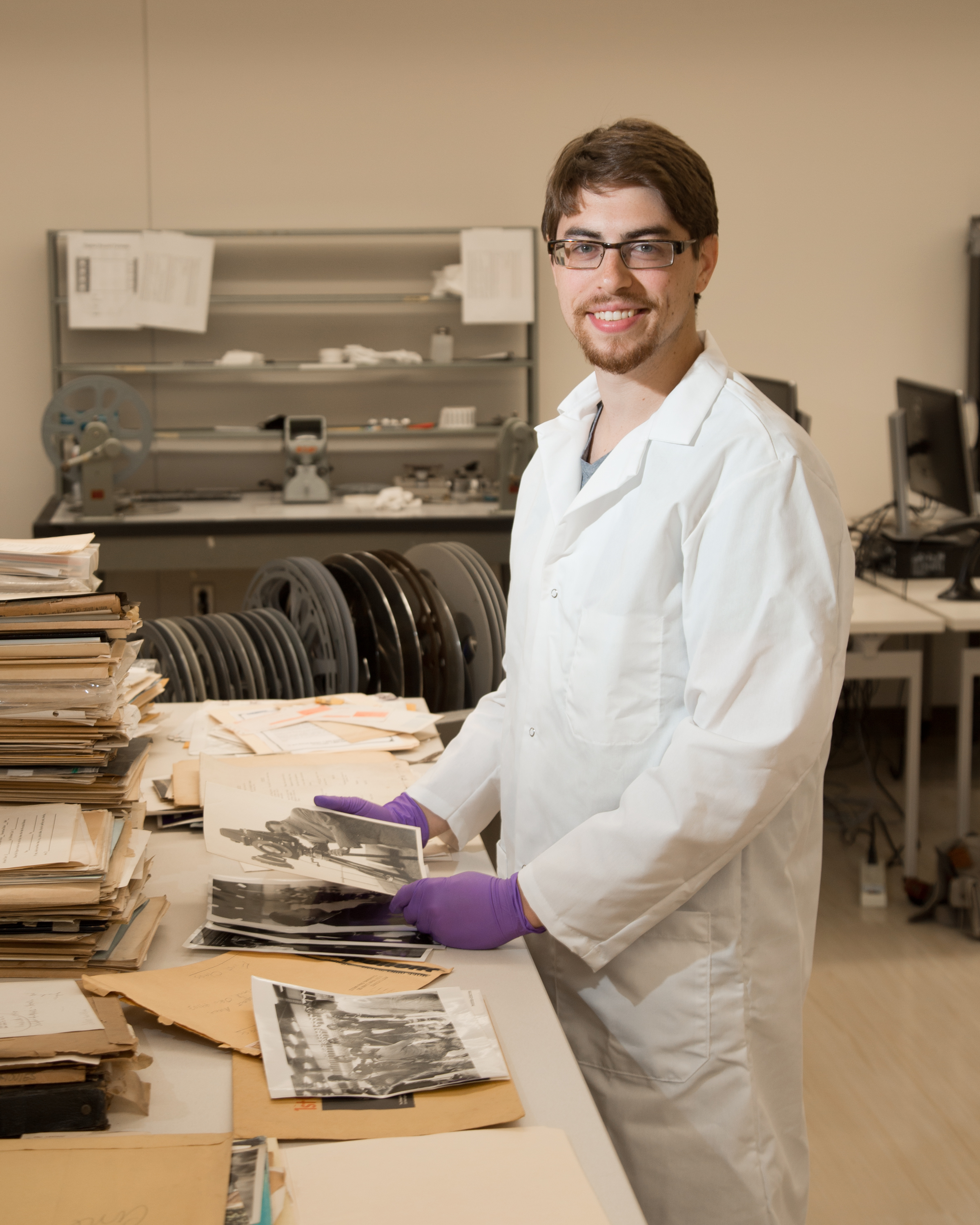 photo of intern inside the Moving Image Archive workroom
