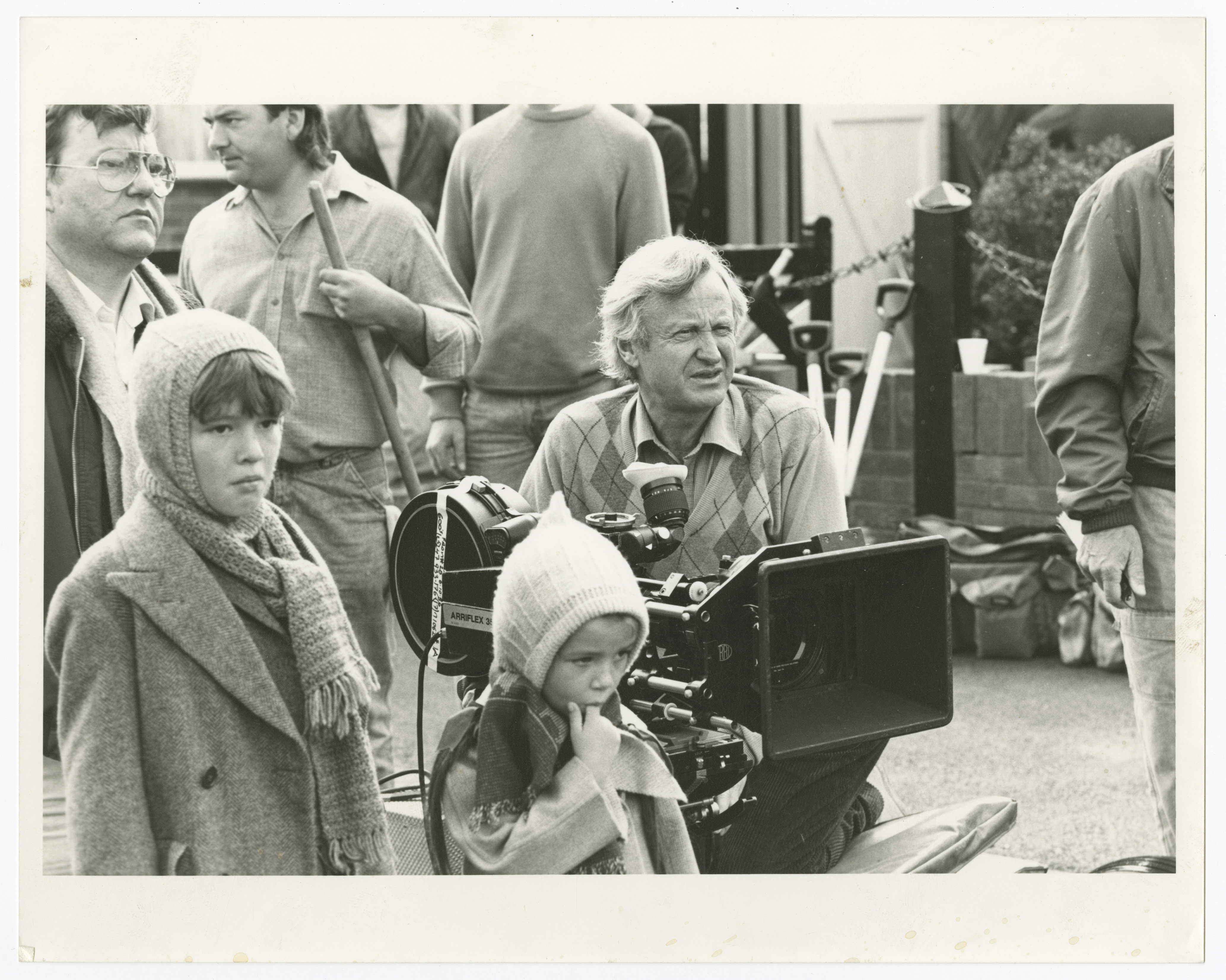 John Boorman behind the camera with child actors on the set of Hope and Glory