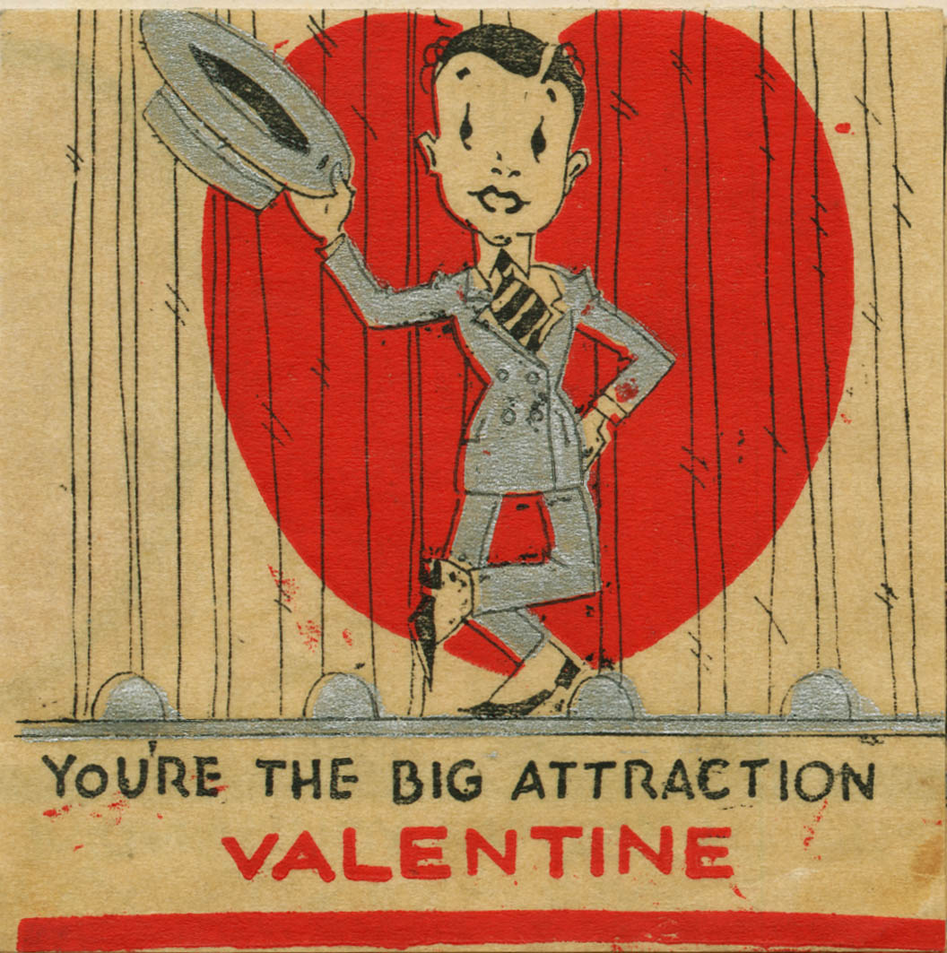 Valentine's Day card with color illustration of a male figure in a suit in front of a heart. Text reads You're the Big Attraction VALENTINE