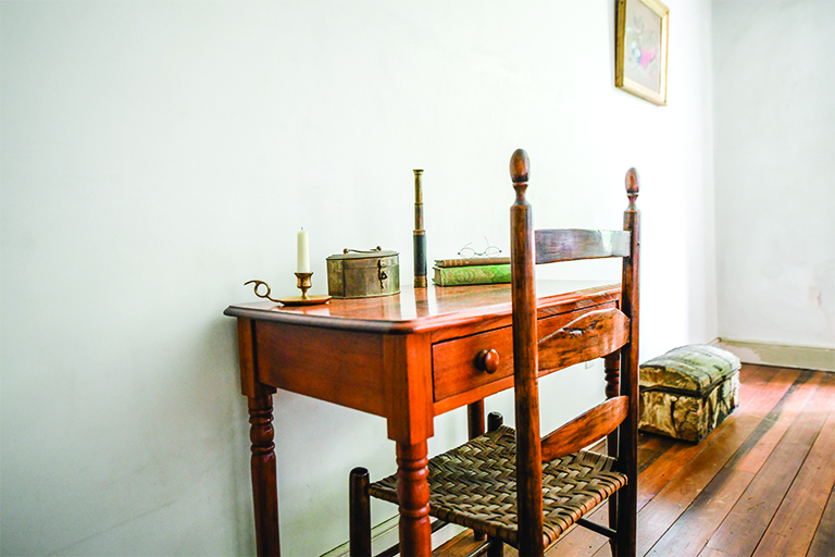 An antique table and chairs 