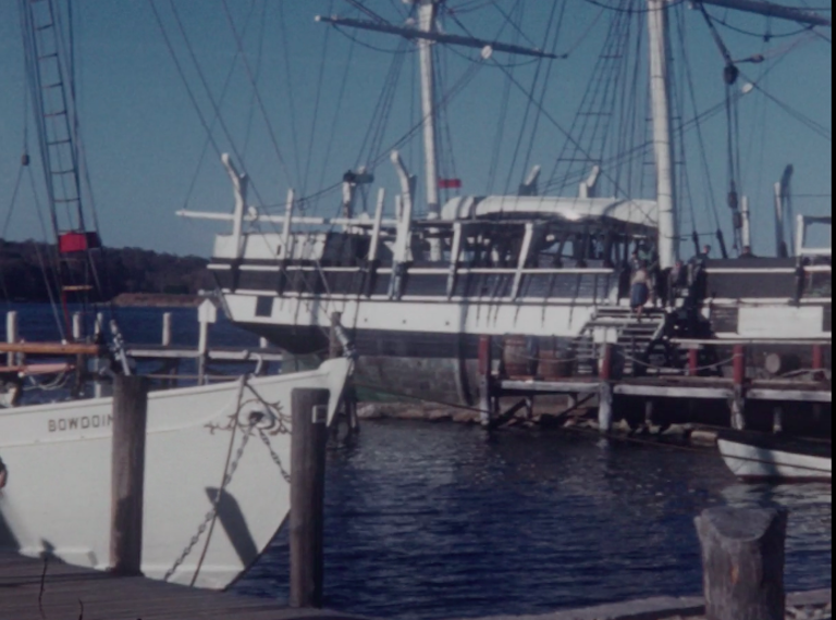 still from Brennan home movie showing a sail boat