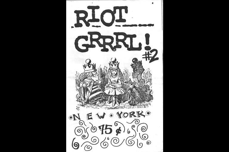 Magazine cover with drawing of Alice in Wonderland and the words, "Riot Grrrl!"