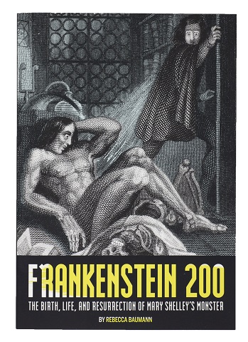 Frankenstein's monster reclining on the floor, with Dr. Frankenstein aghast