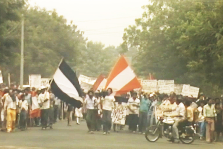 A color image from a video recording of a 1987 street protest in Nicaragua.