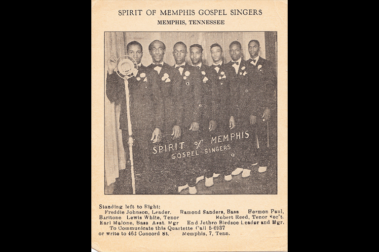 Old newspaper clipping showing the gospel group The Spirit of Memphis dressed in suits and lined up by a microphone.