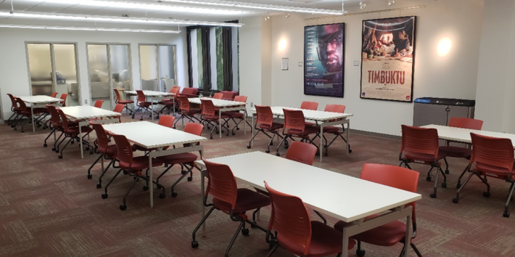 tabletop seating in media services with movie posters in the background