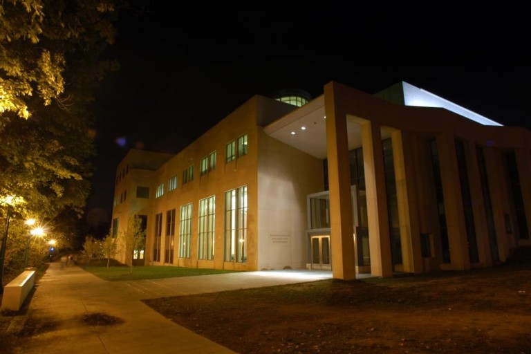  Color photograph of the exterior of the Neal-Marshall Center at night.