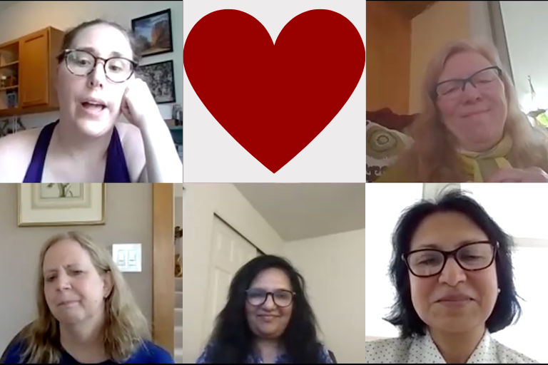 Five members of the Feminist Research Collective with the image of a heart.