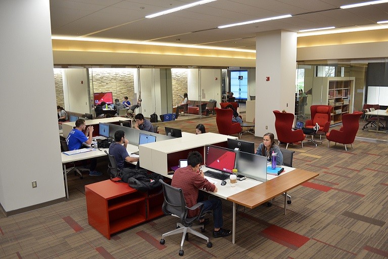 Scholars' Commons showing computer workstations and collaboration rooms