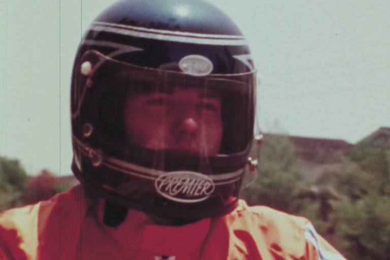 a motorcycle rider wearing a helmet