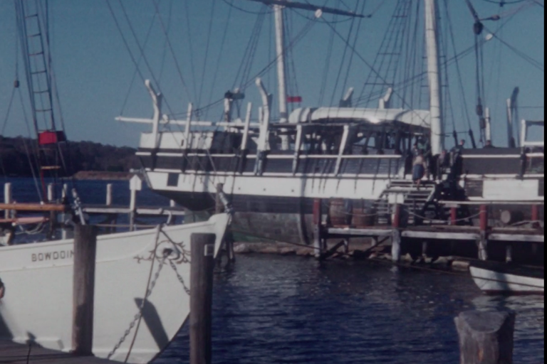 still from Brennan home movie showing a sail boat