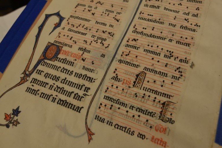 A medieval manuscript with ornate lettering