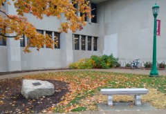 The bench and boulder where the apology is memorialized.