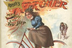 Woman riding red bicycle in the foreground, man in uniform also on bicycle in the background
