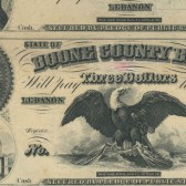 Three dollar bill issued by the Boone County Bank featuring an American eagle with wings spread.